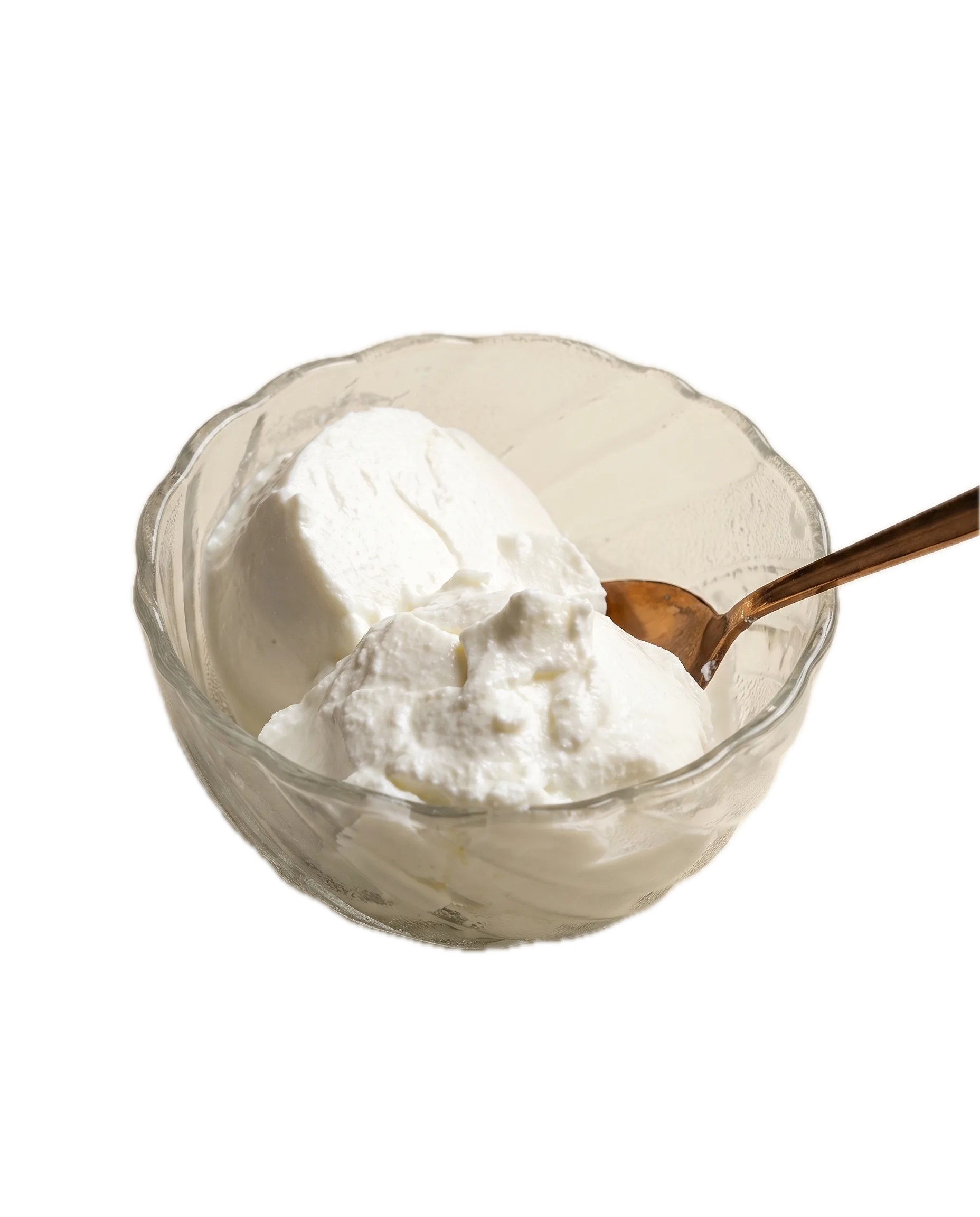 Two scoops of set dahi in a glass bowl, holding their shape around a spoon